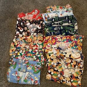 12 custom  Women's size large Scrub tops, Mainly Christmas